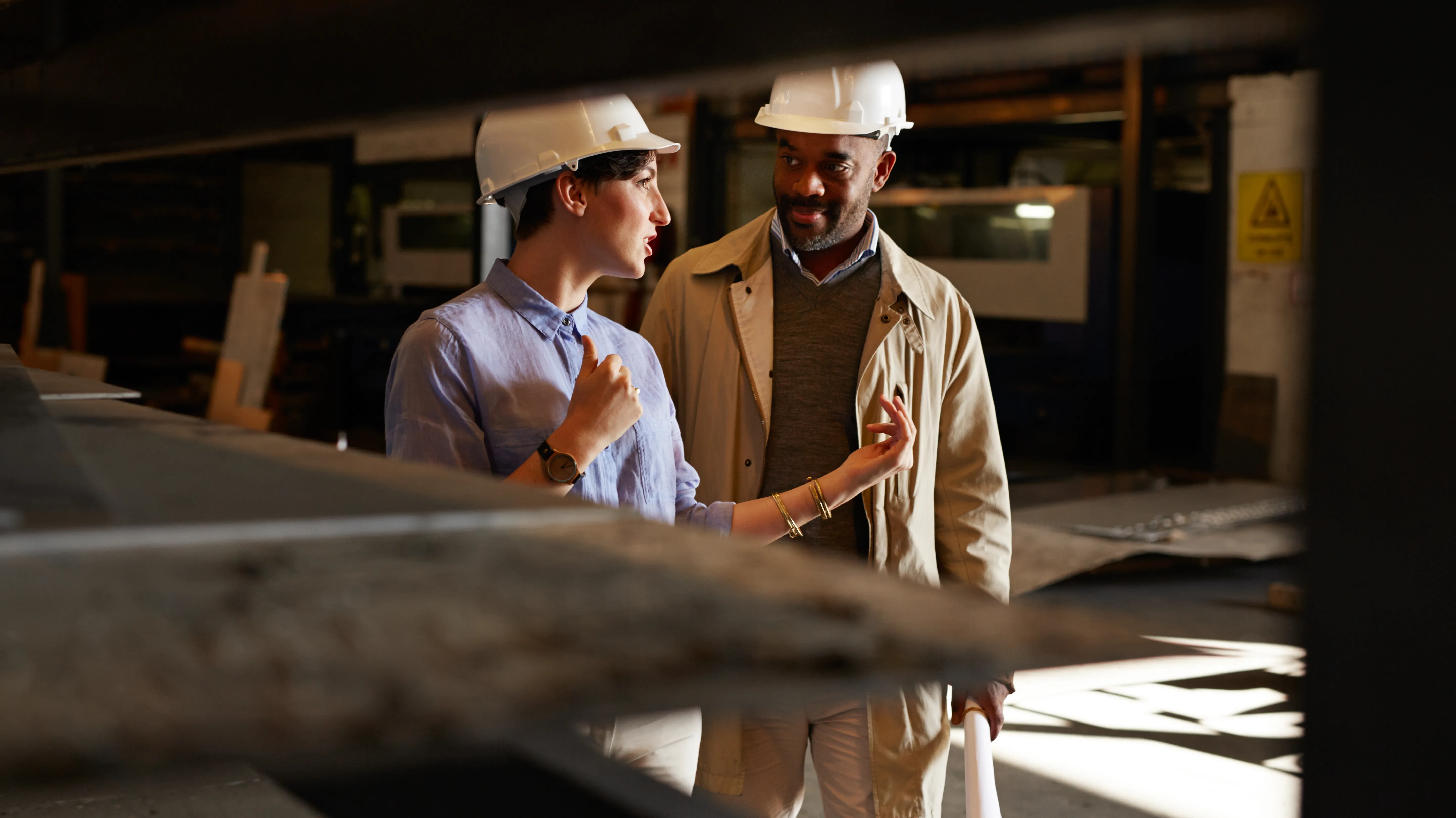 Workers in conversation hearing aids