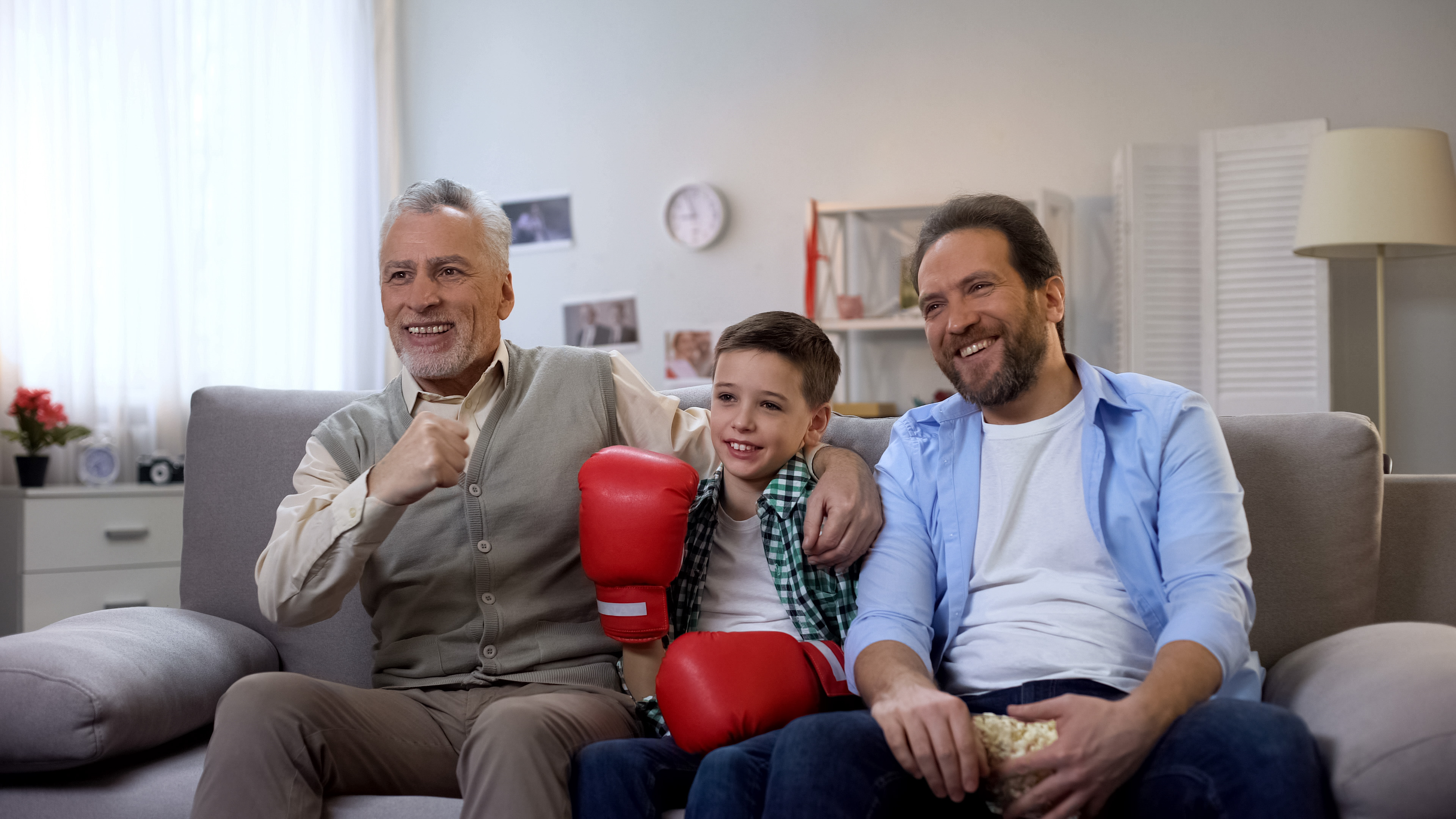 Family in front of TV hearing aids