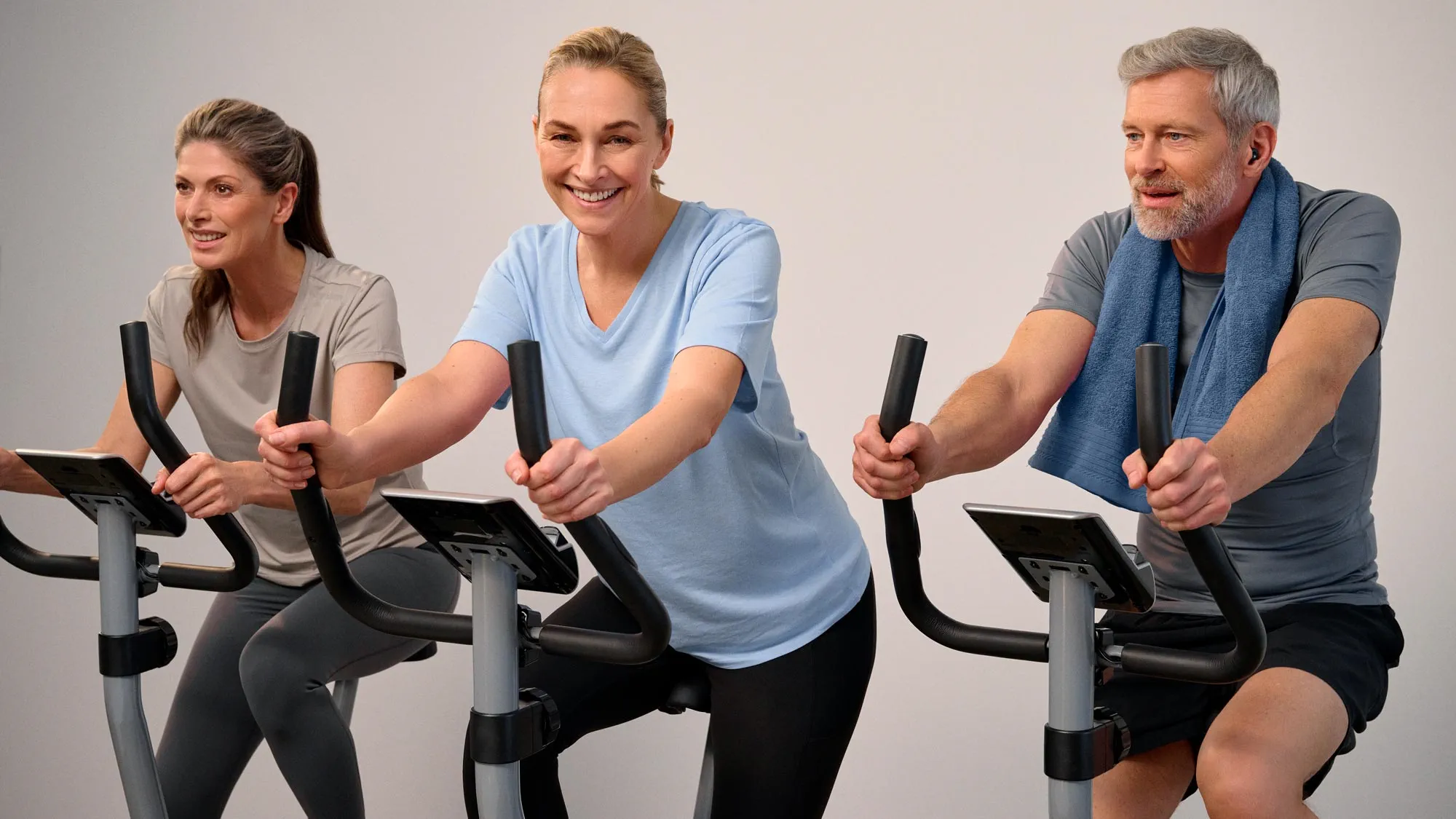 Active friends biking, showing hearing improvement.