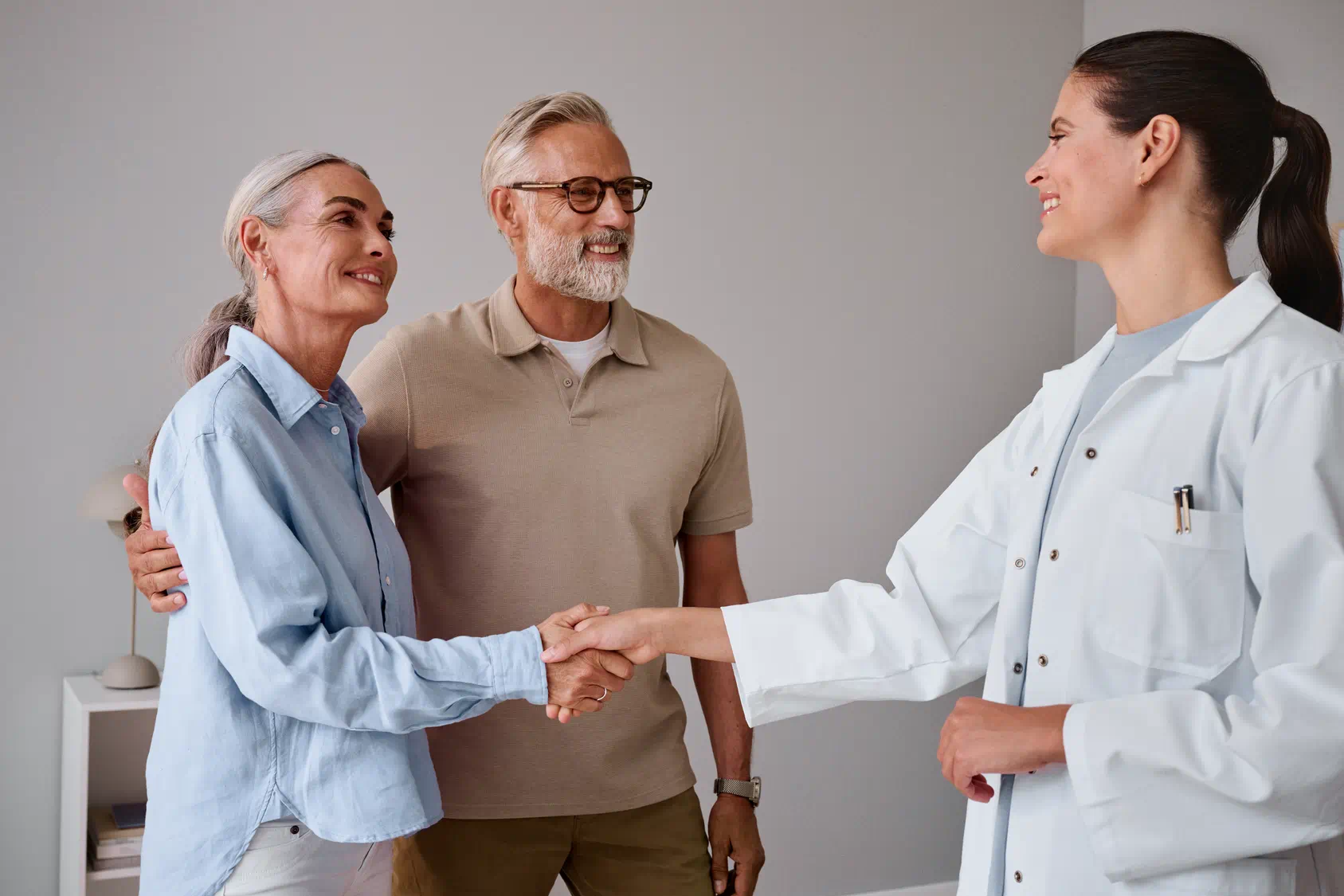 couple greeting audiologist