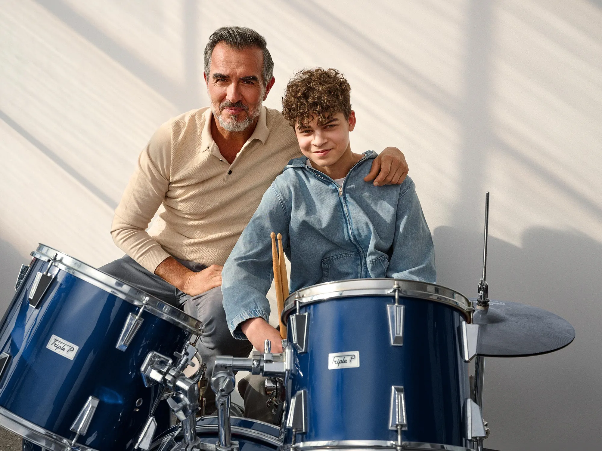 grandparent-kid-drums-hearing-aids-16x9