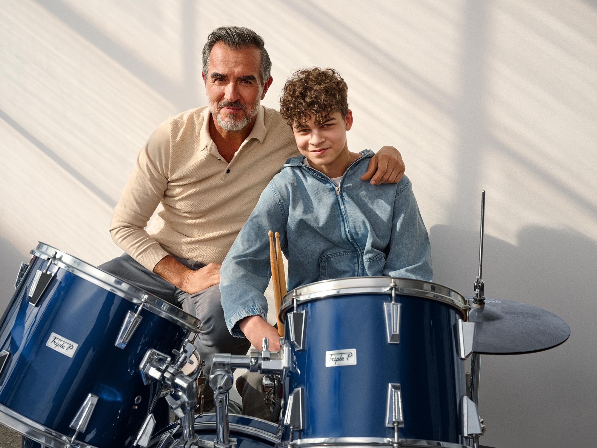 grandparent-kid-drums-hearing-aids-16x9