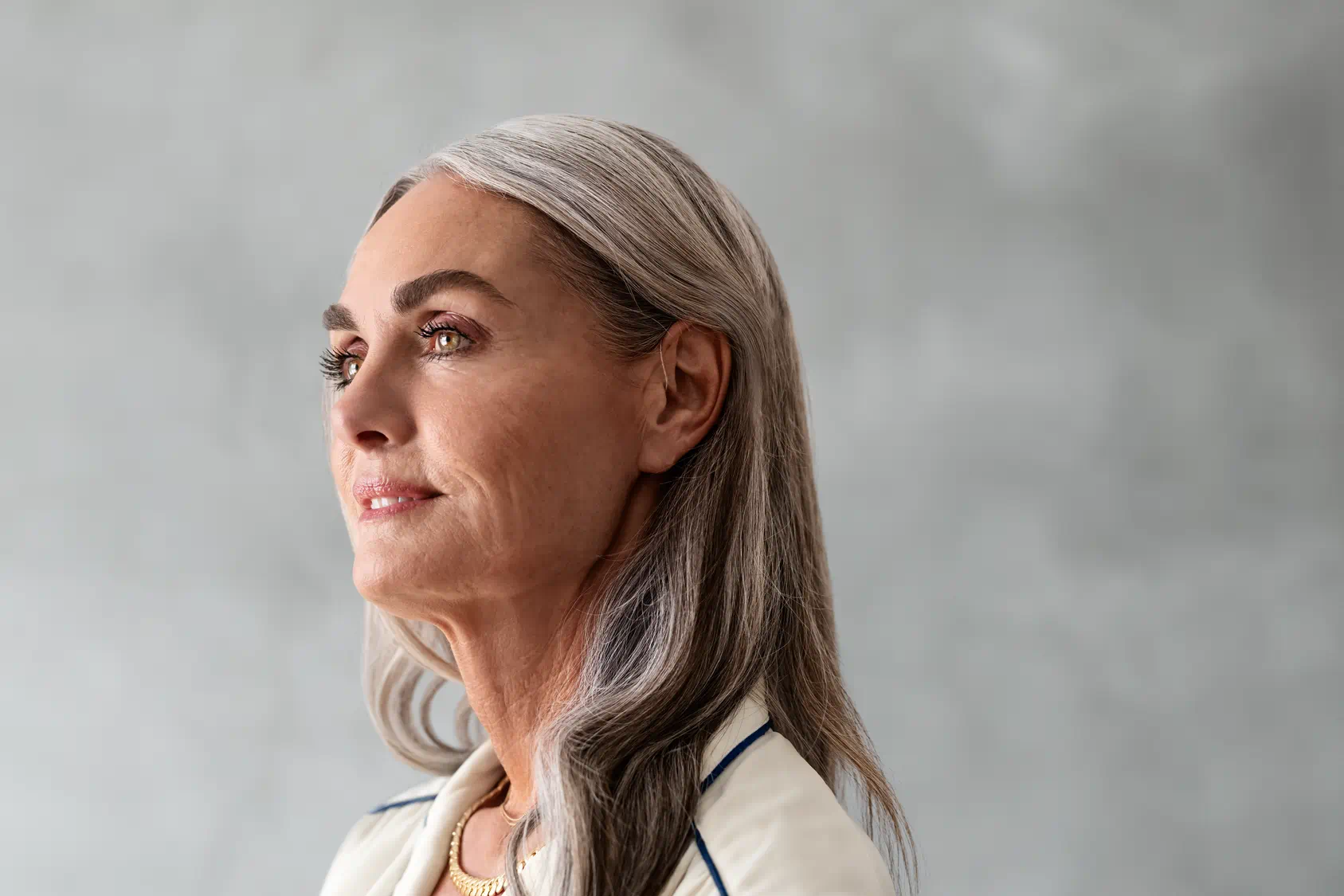 Woman staring hearing aid