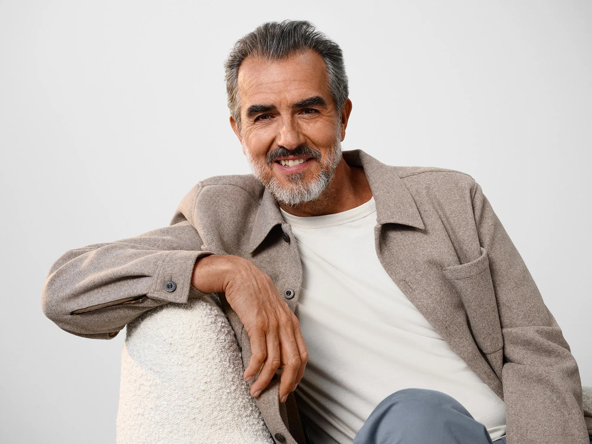comfortable-man-laughing-hearing-aids-4x3