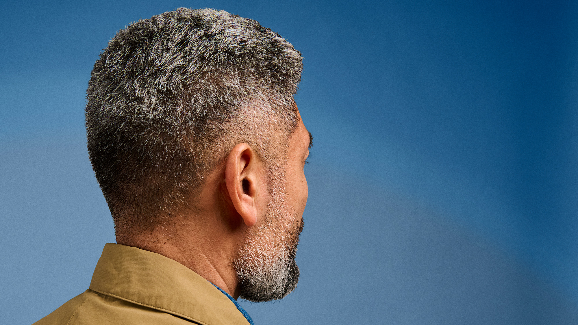 Signia Insio IX hearing aids seen in mans ear to show how invisible they are.