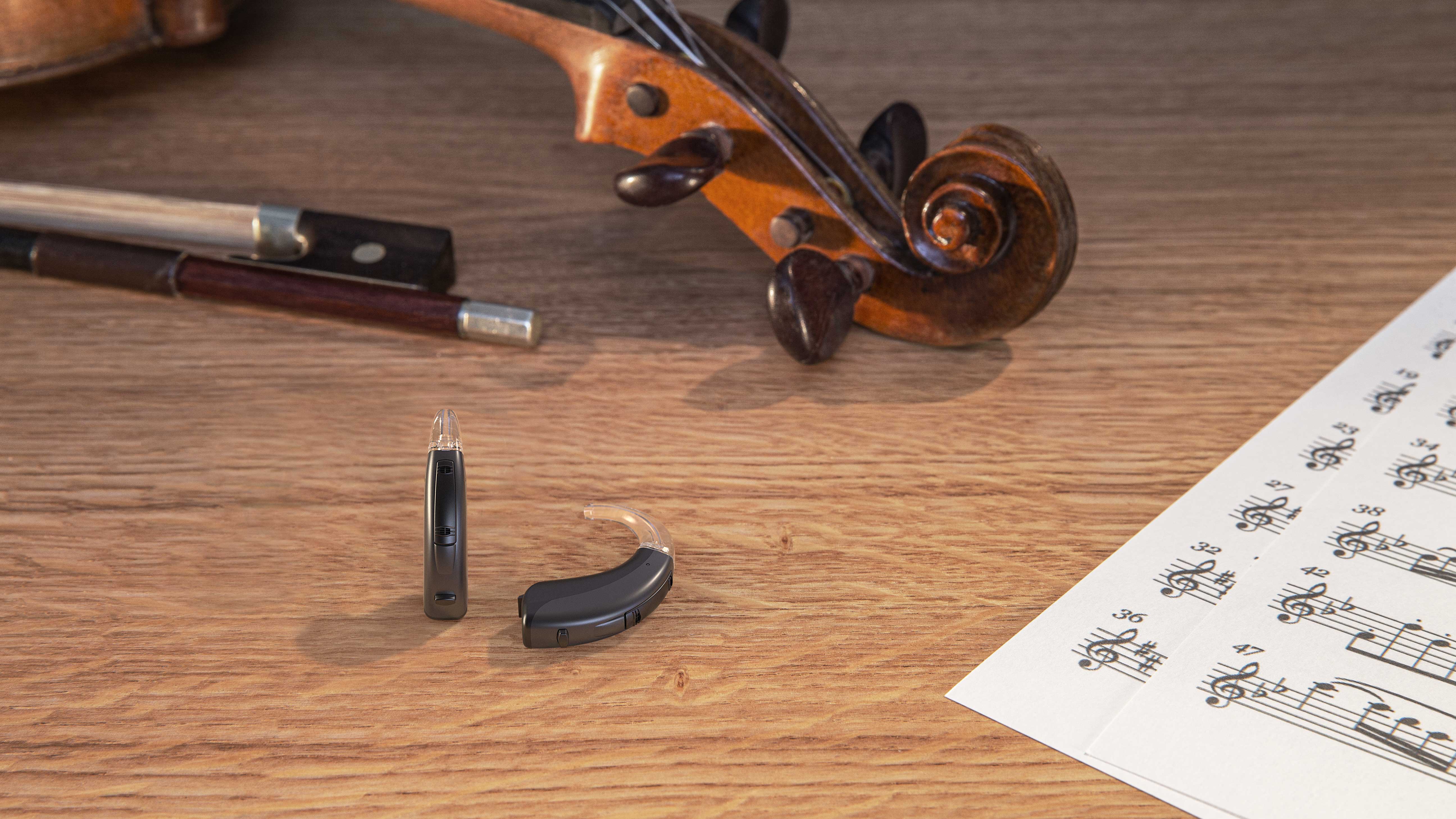 Widex behind the ear 312 represented in a home environment to show the true size of the hearing aid. 