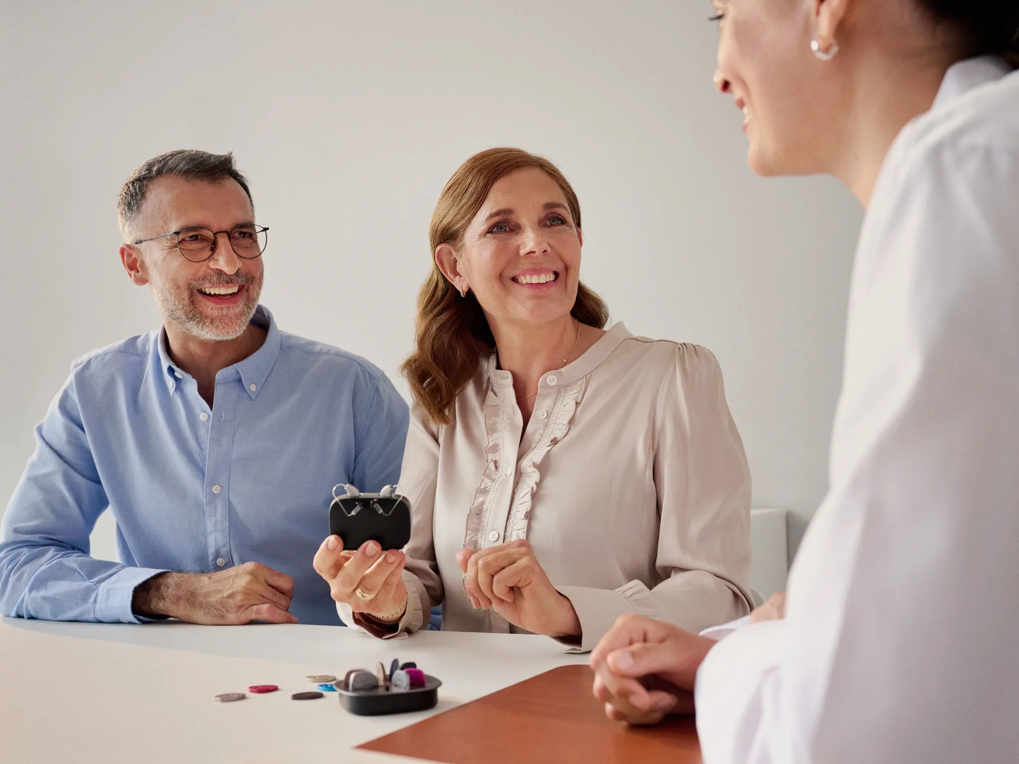 choosing-2-hearing-aid-hearing-appointment-coat-4x3