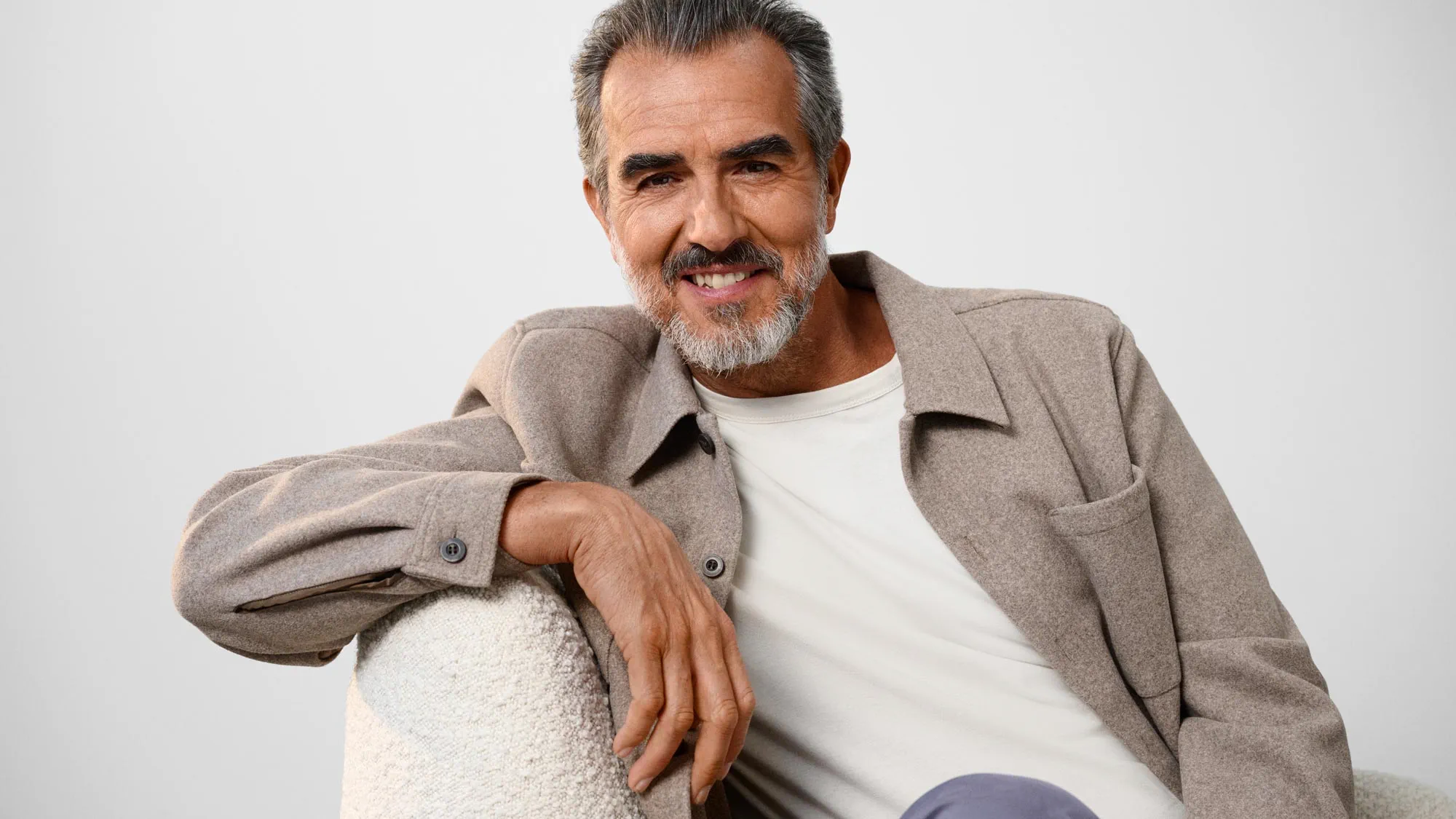 comfortable-man-laughing-hearing-aids-16x9