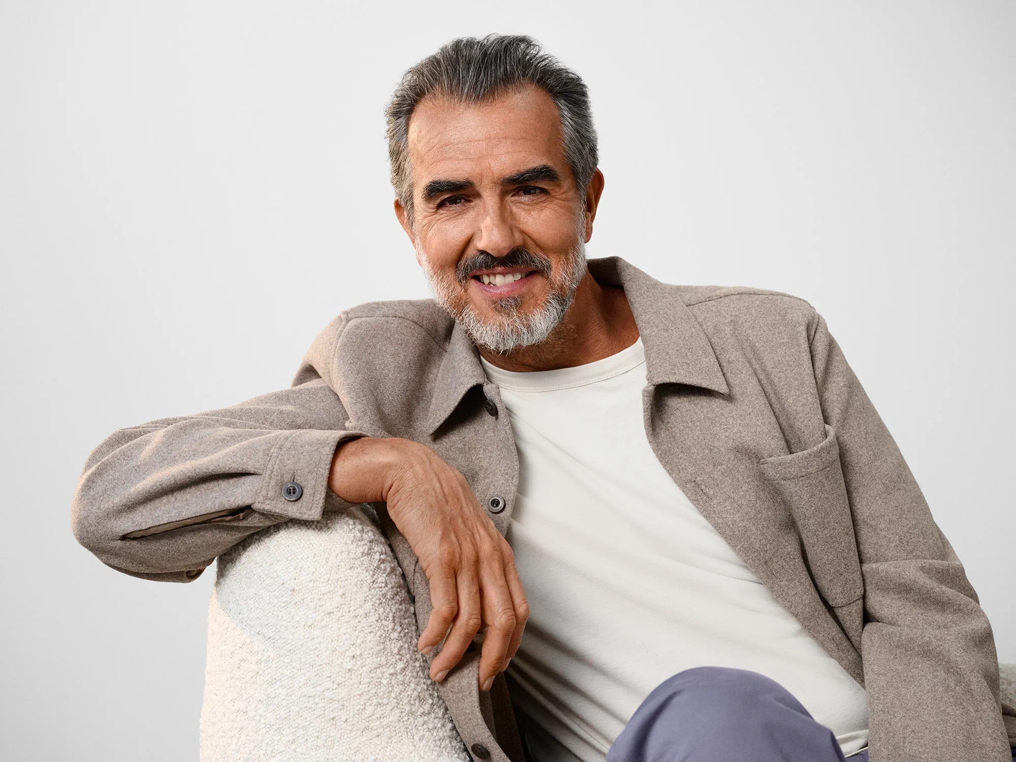 comfortable-man-laughing-hearing-aids-4x3