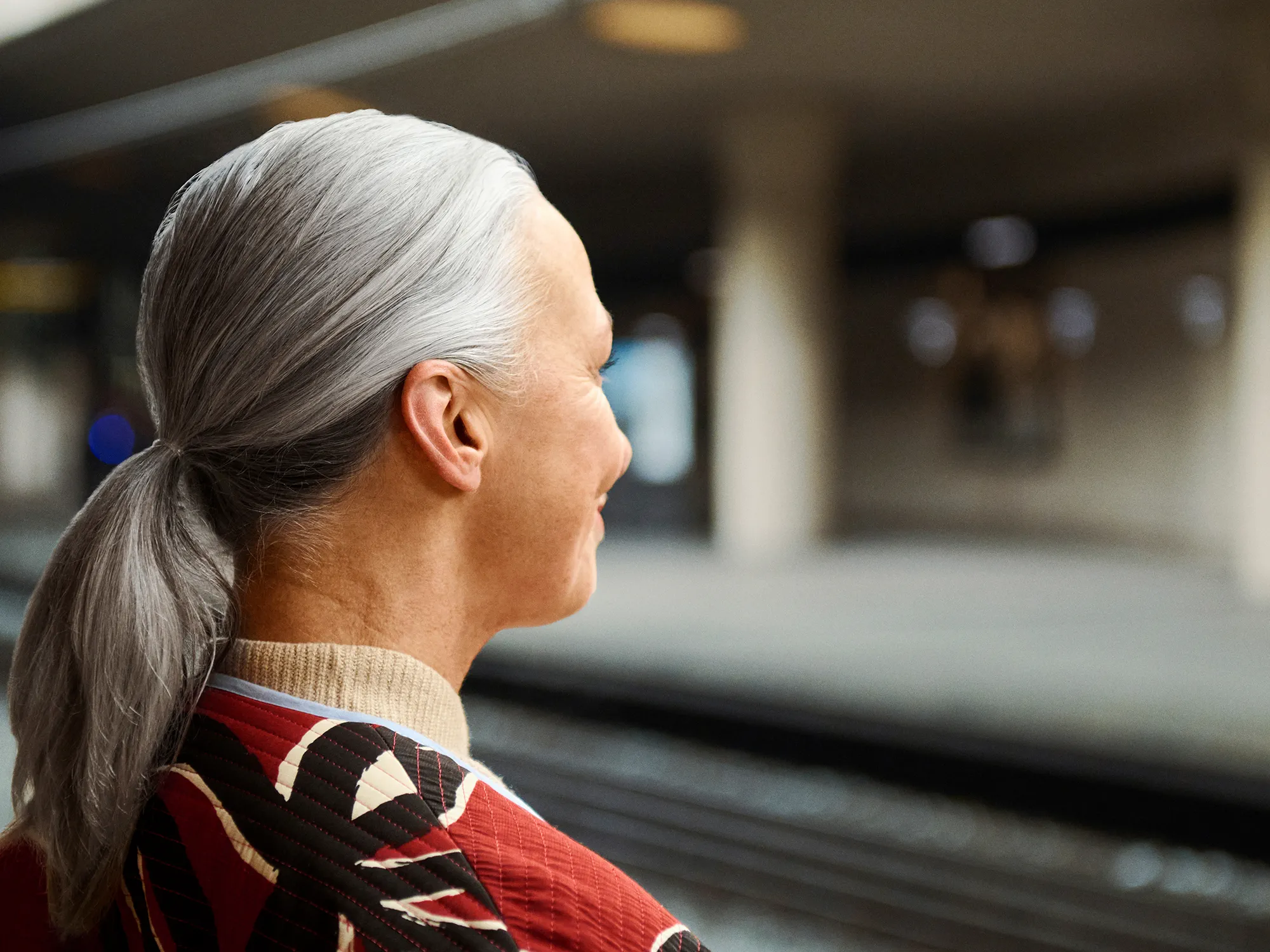 Signia Insio IX hearing aids seen in womans ear to show how invisible they are.