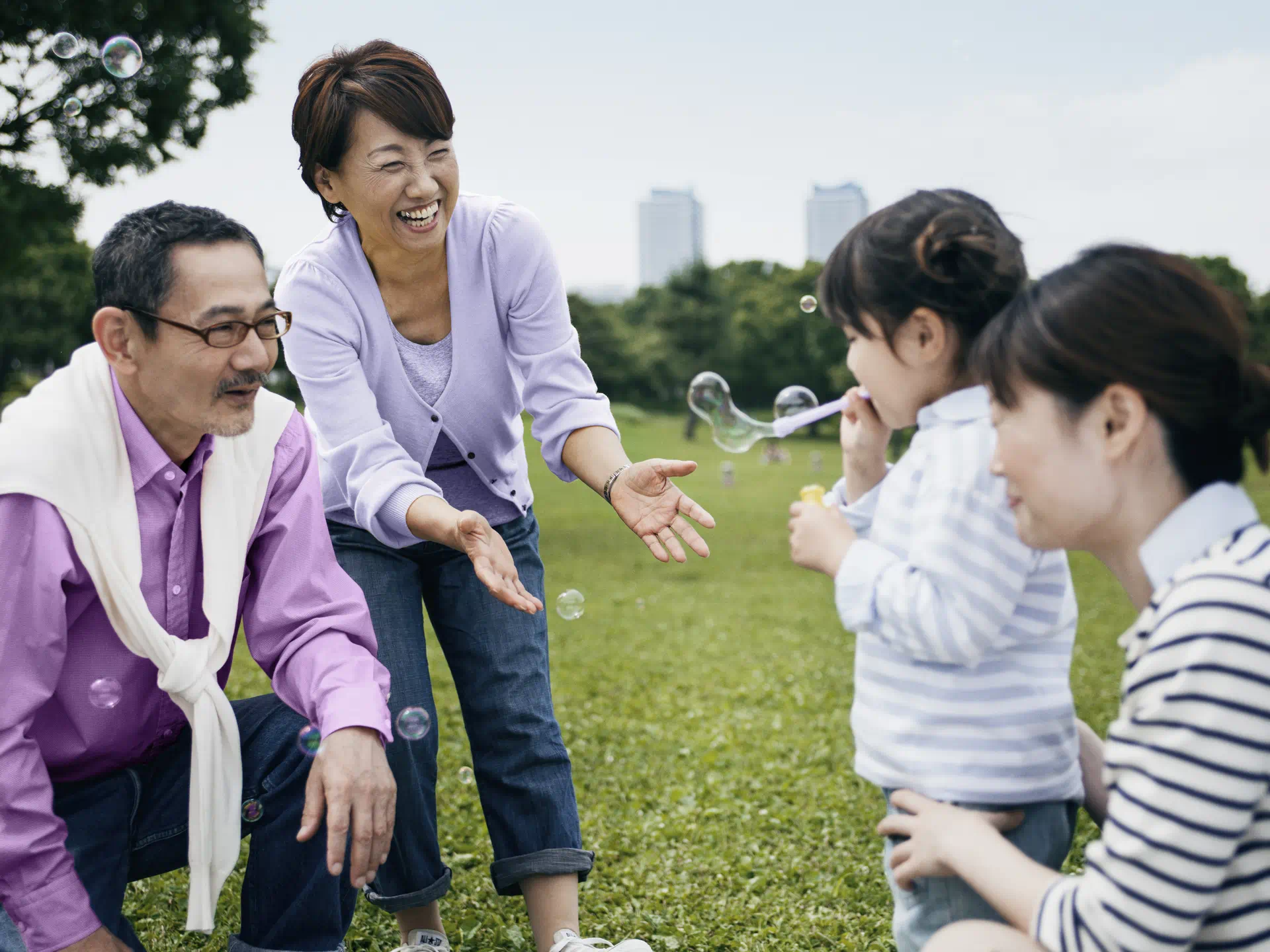 Wearing hearing aids in the park listening to grandchildrens music with bring joy to your heart