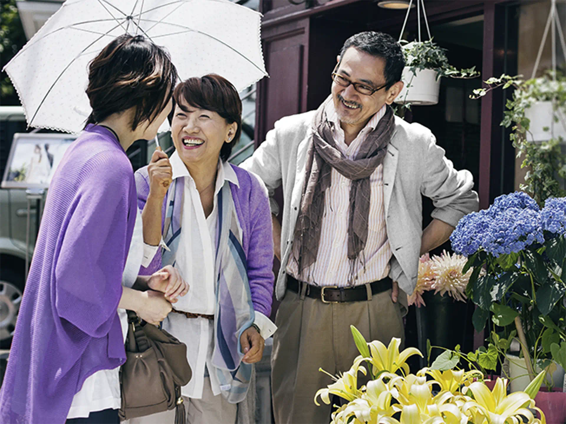 Wearing hearing aids while hanging out with family helps you hear social chats with friend