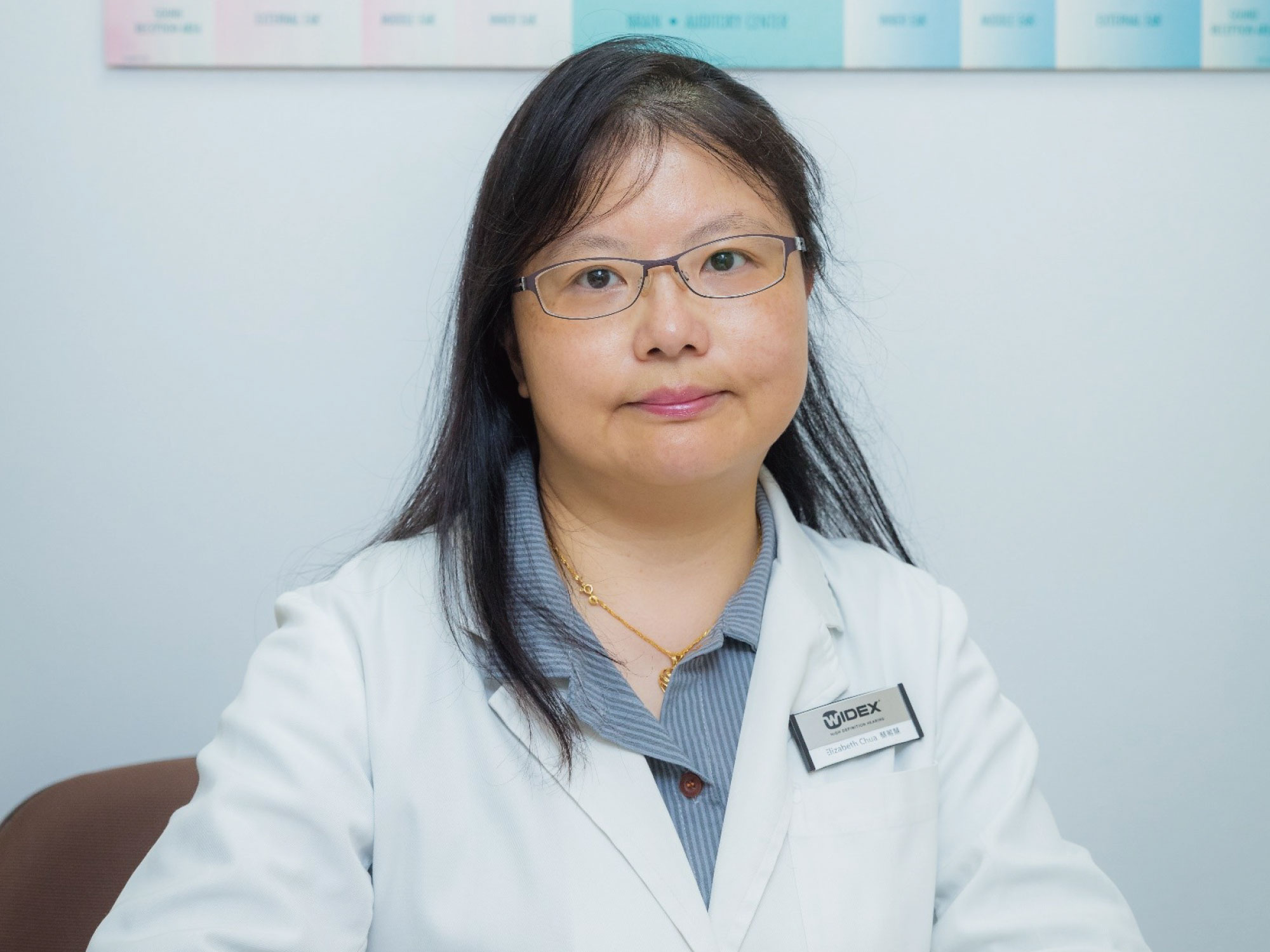 Audiologist team member hearing aids
