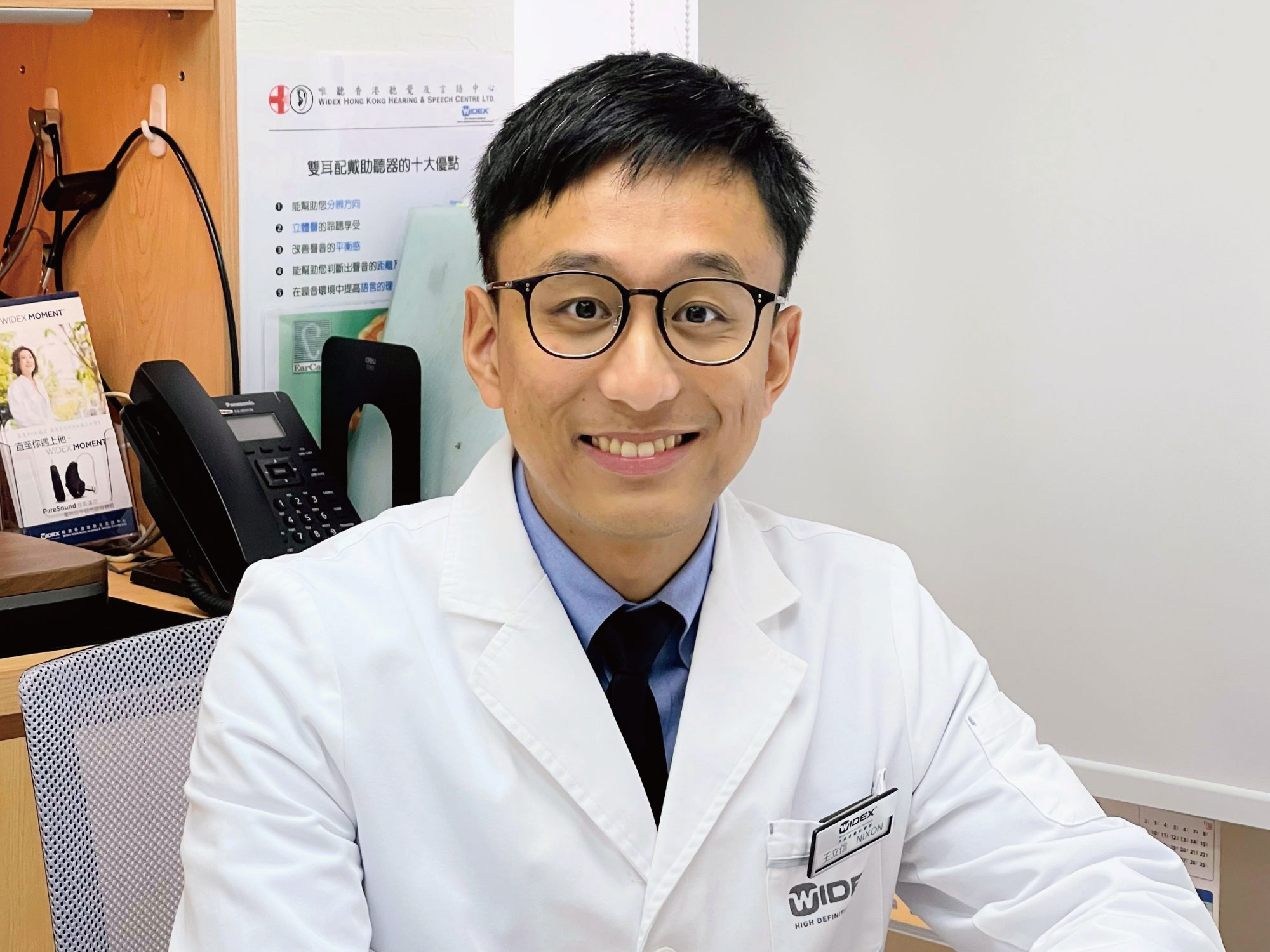 Audiologist team member hearing aids