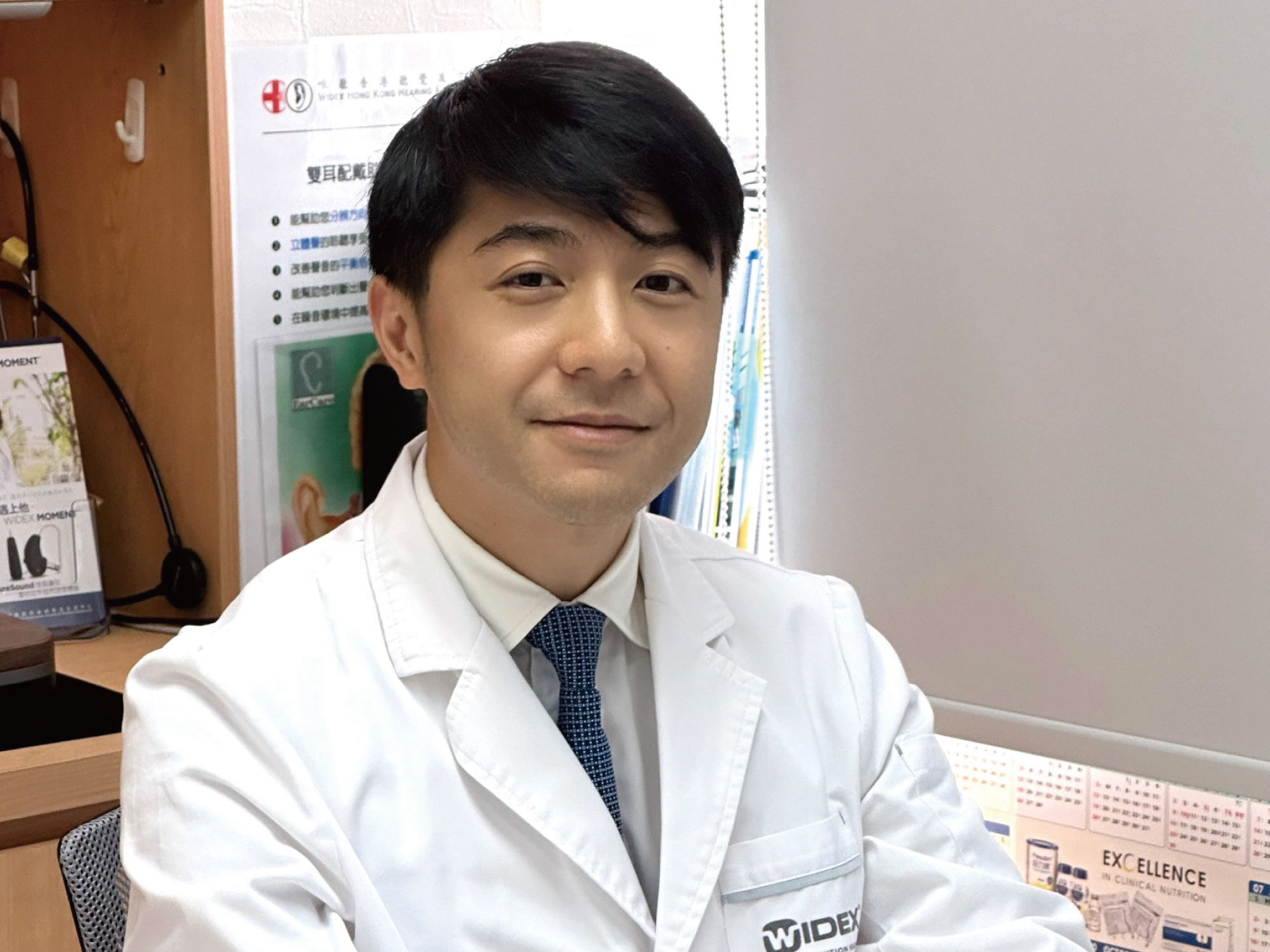 Audiologist team member hearing aids