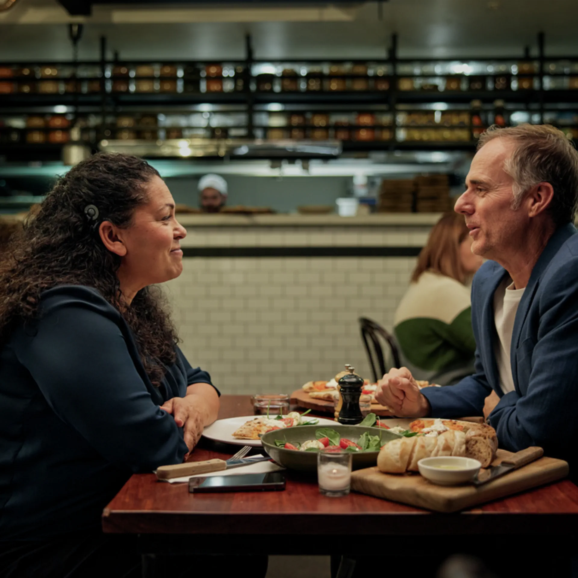 restaurant couple coclear implant hearing aids
