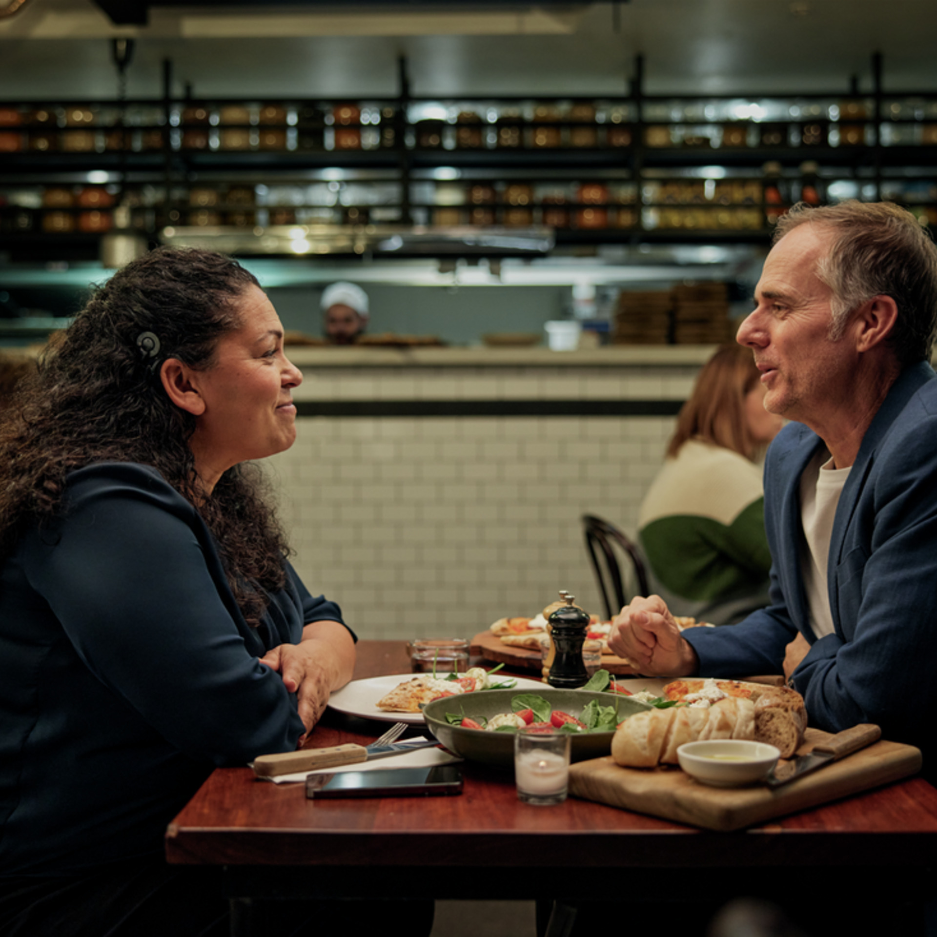 restaurant couple coclear implant hearing aids